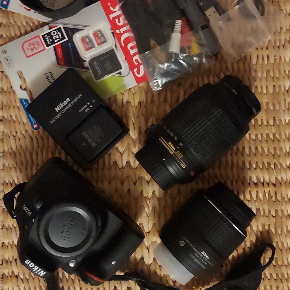 Nikon D5200 DSLR camera with accessories